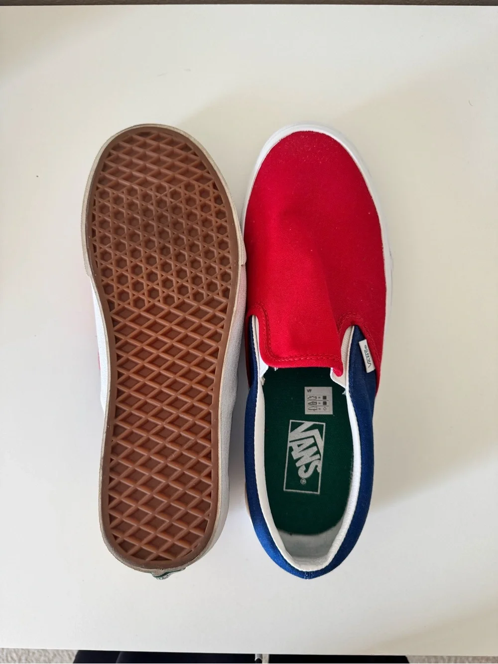 Vans Men’s Slip-On Sneakers in Red and Blue Trim